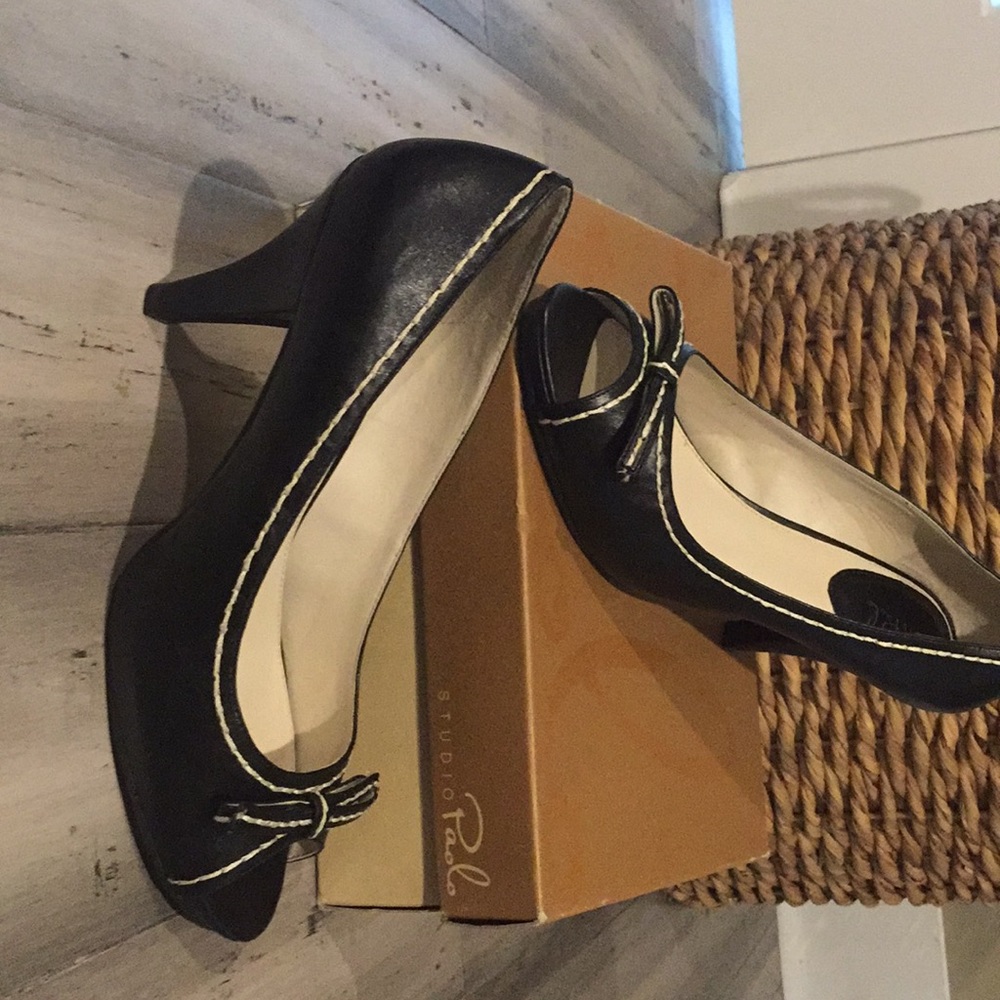 Black open toe pumps.